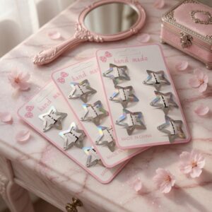 Alternative view of 12 Sets de 6 Estrellas Cuquitas-Pasadores Doradas/Plateadas $9 c/u